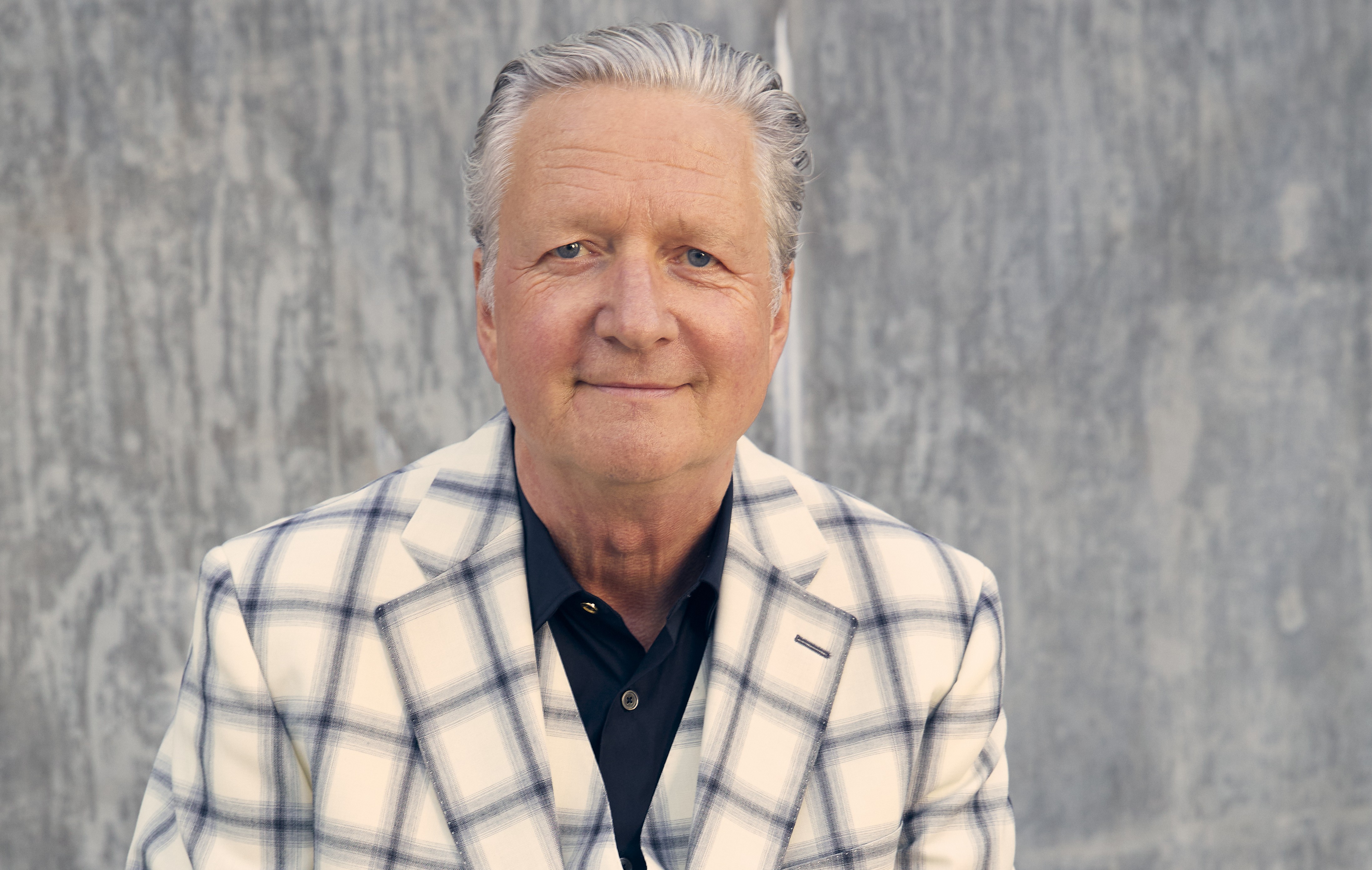 a man in a button up shirt