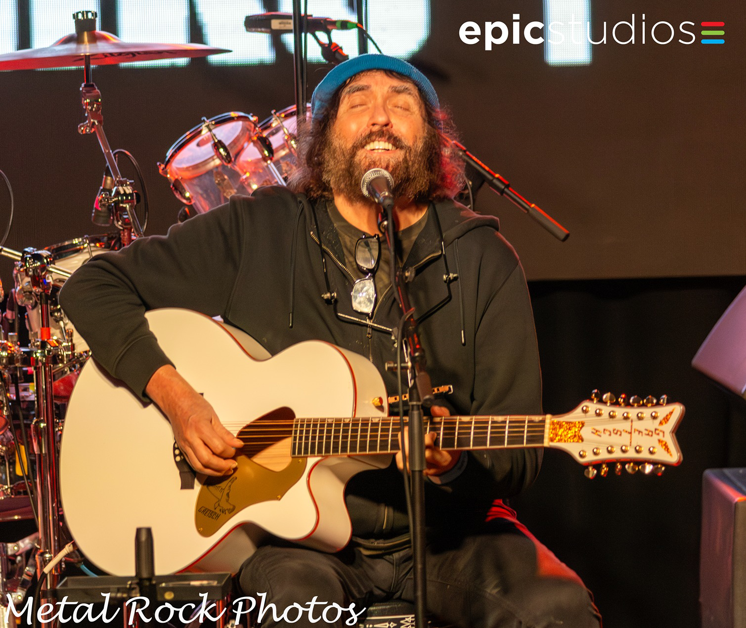 a man playing a guitar