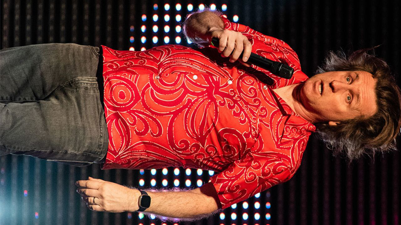 a person holding a microphone
