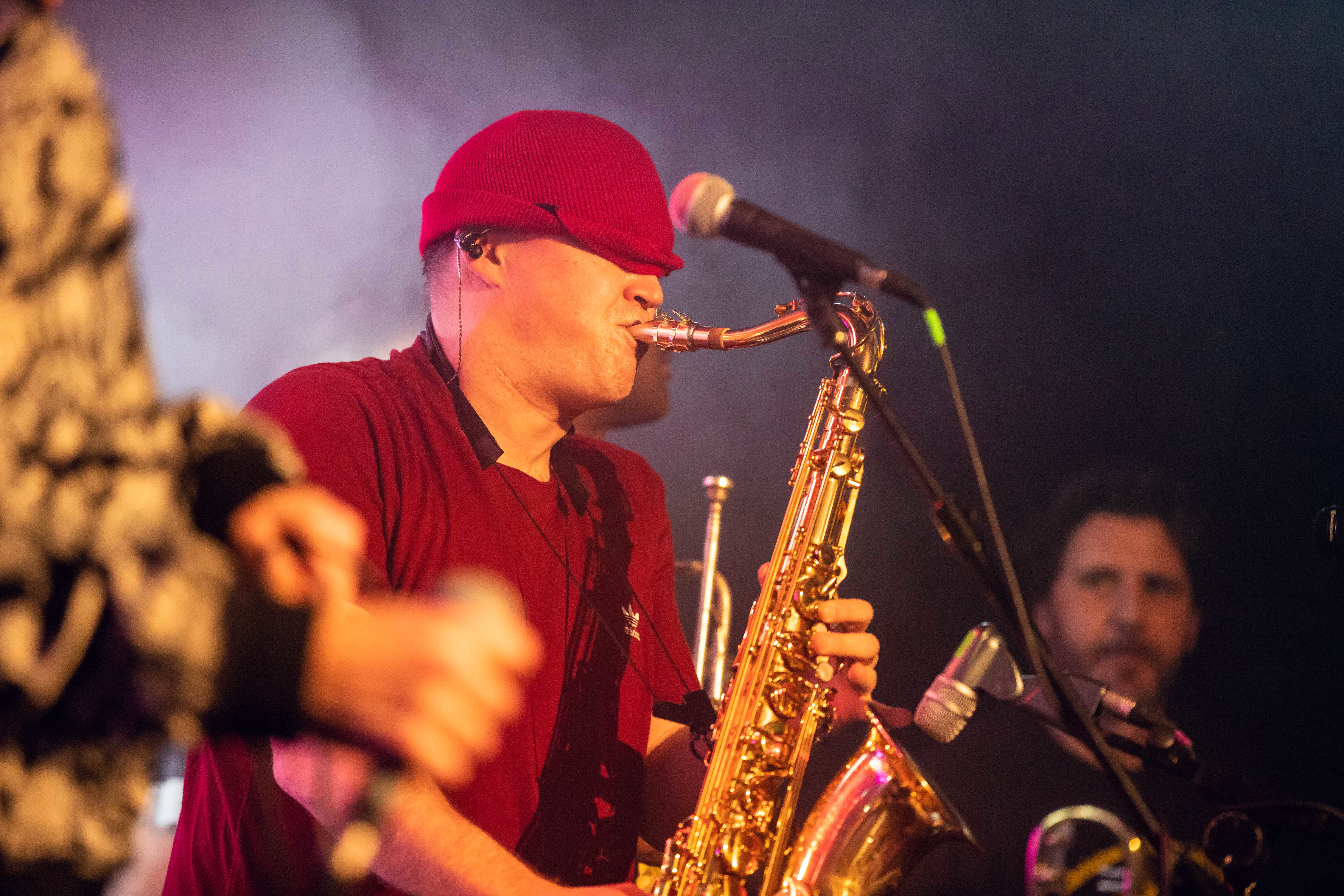 a man playing a saxophone
