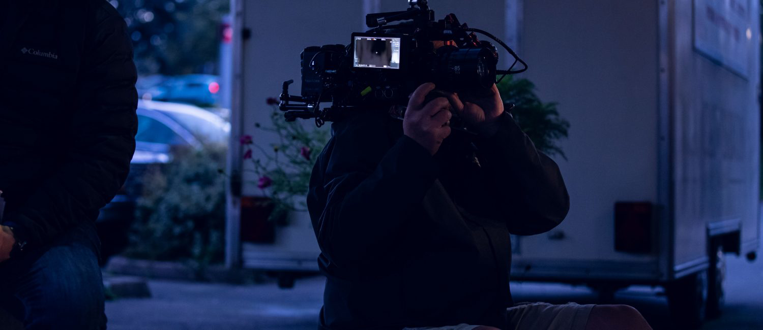 a person holding a camera