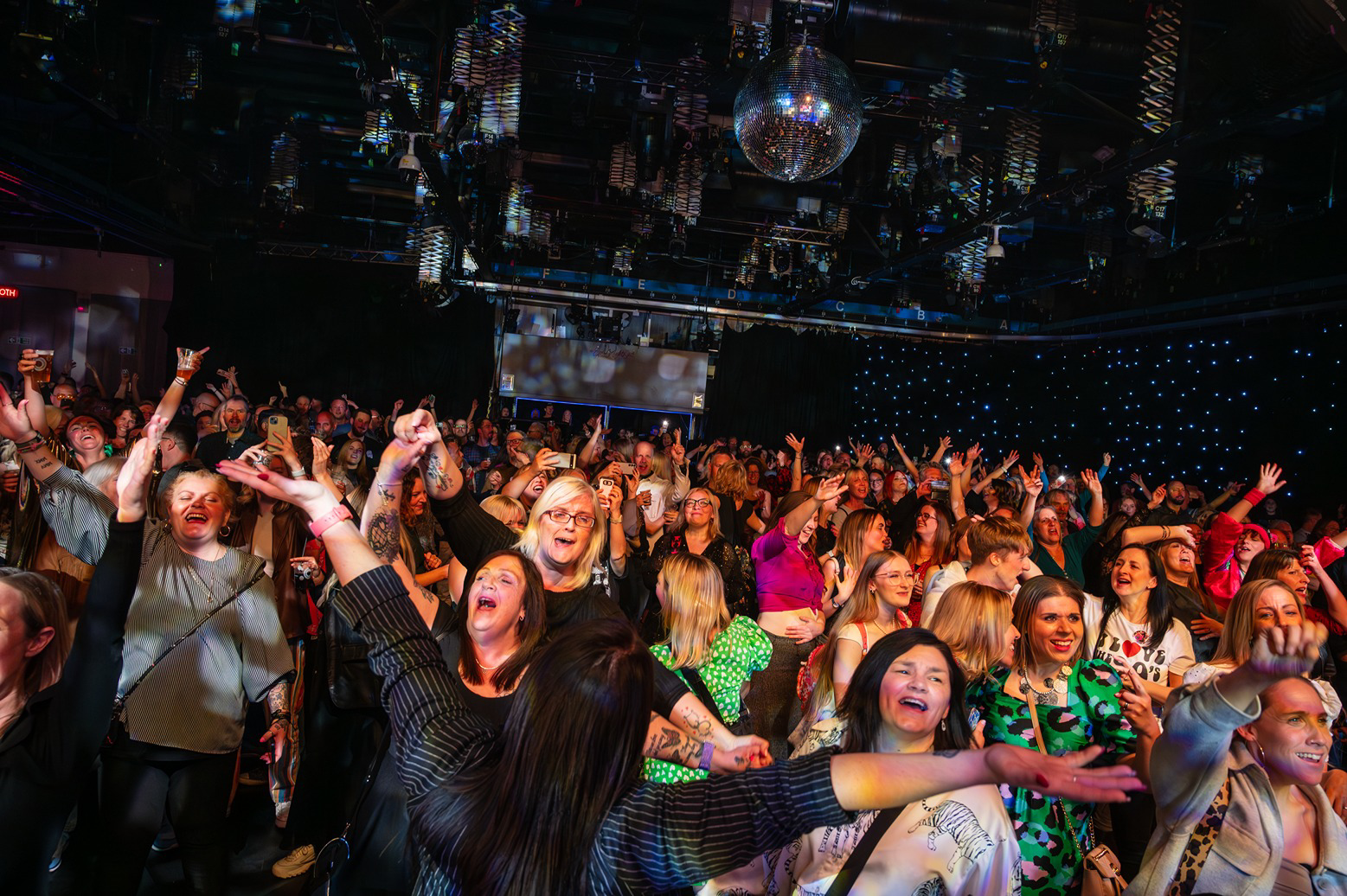 a crowd of people dancing