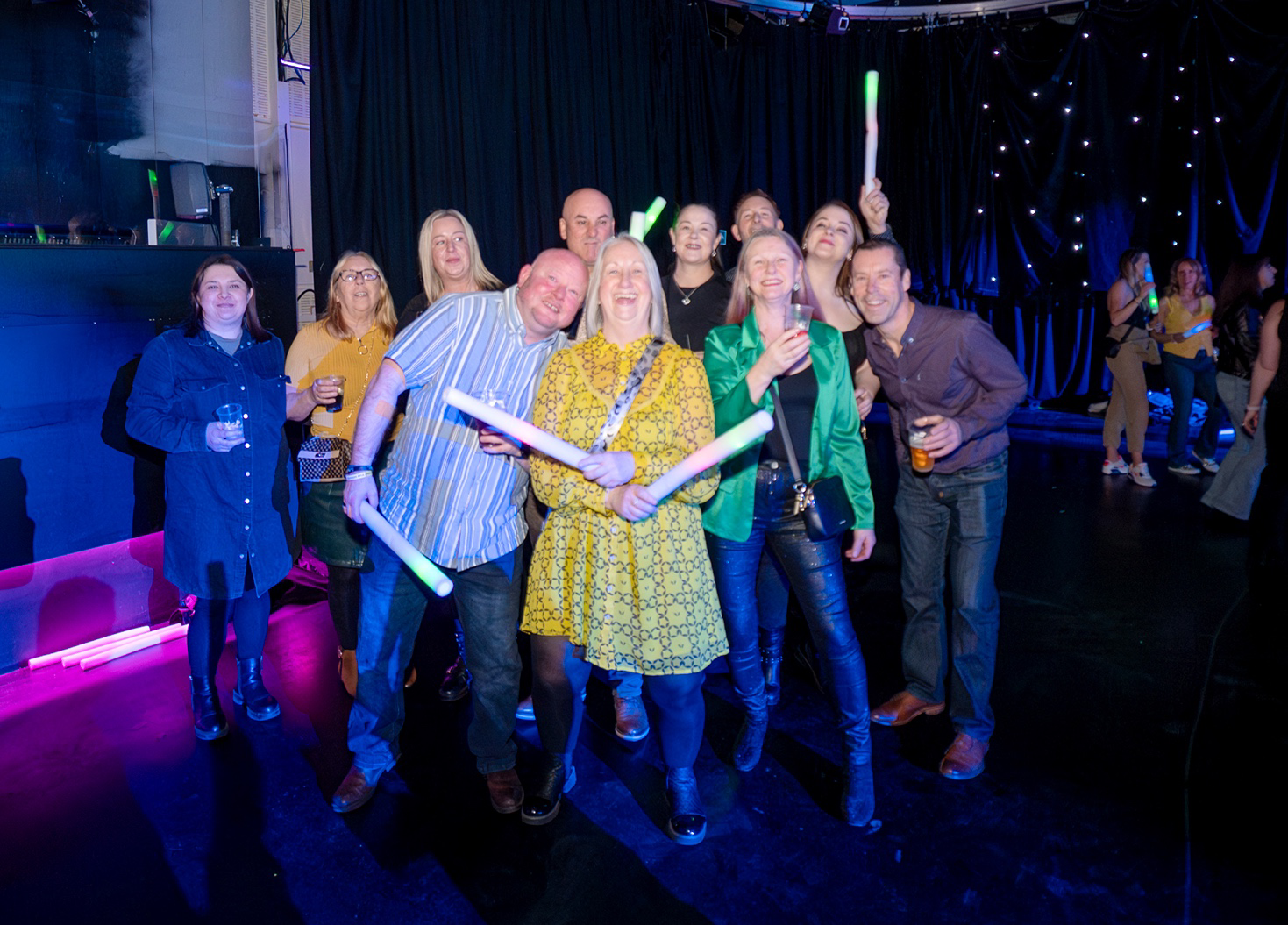 a group of people posing for a photo