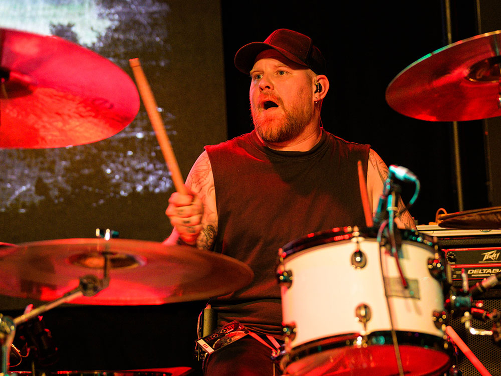 a man playing drums