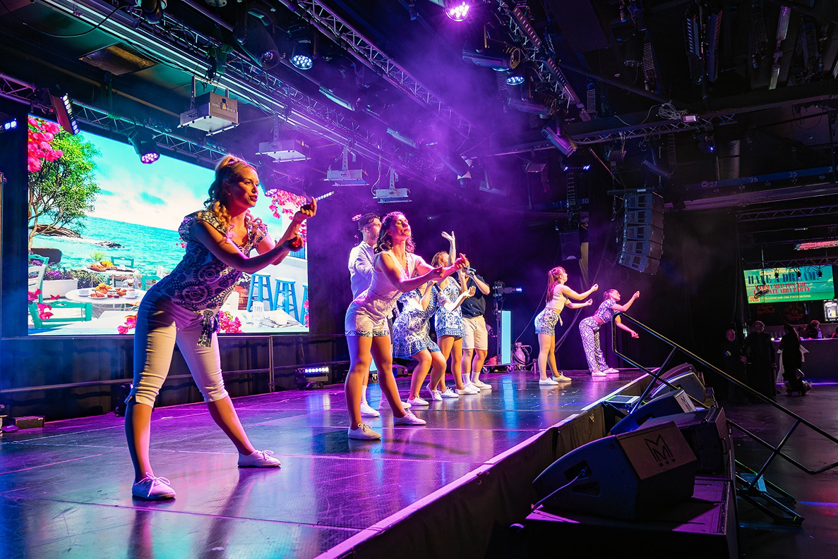a group of people on a stage