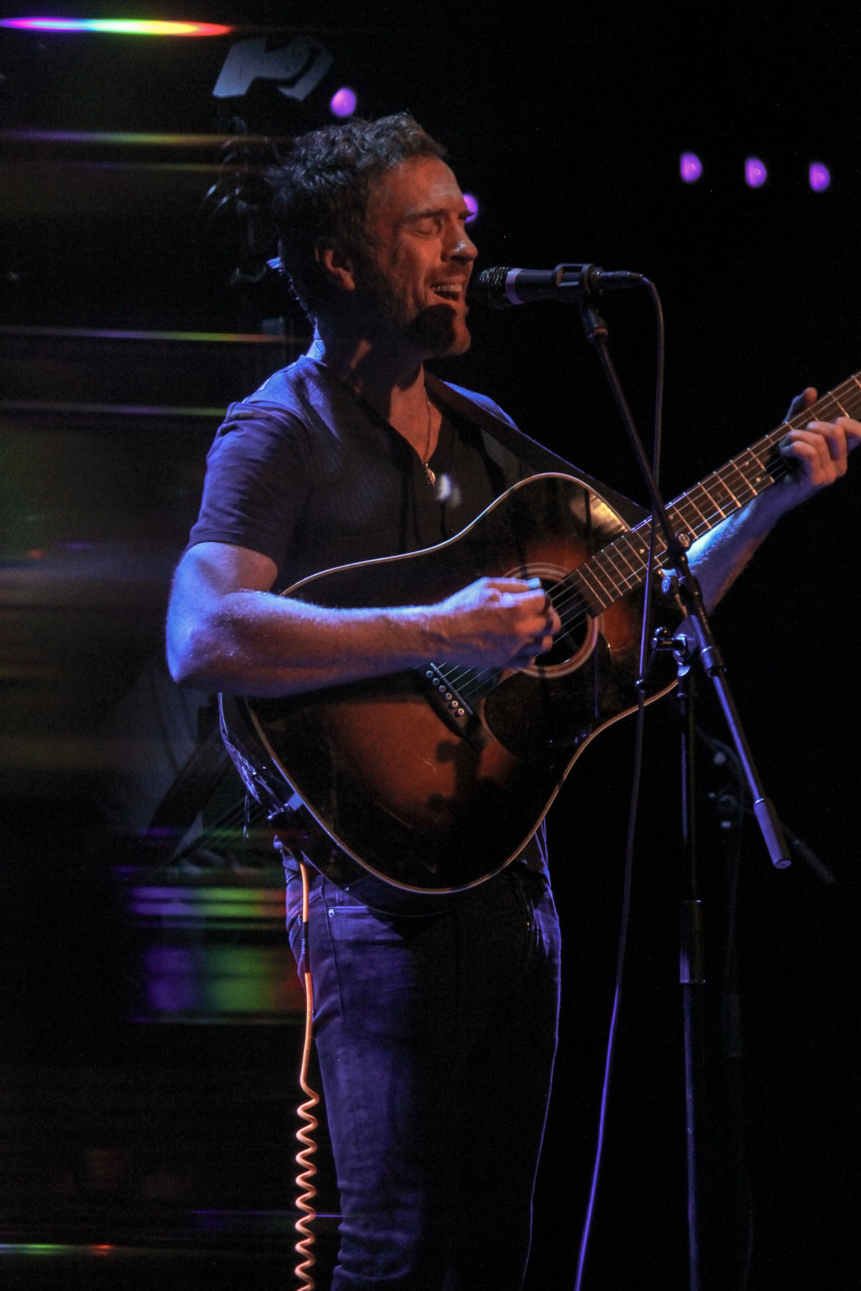 a person playing a guitar