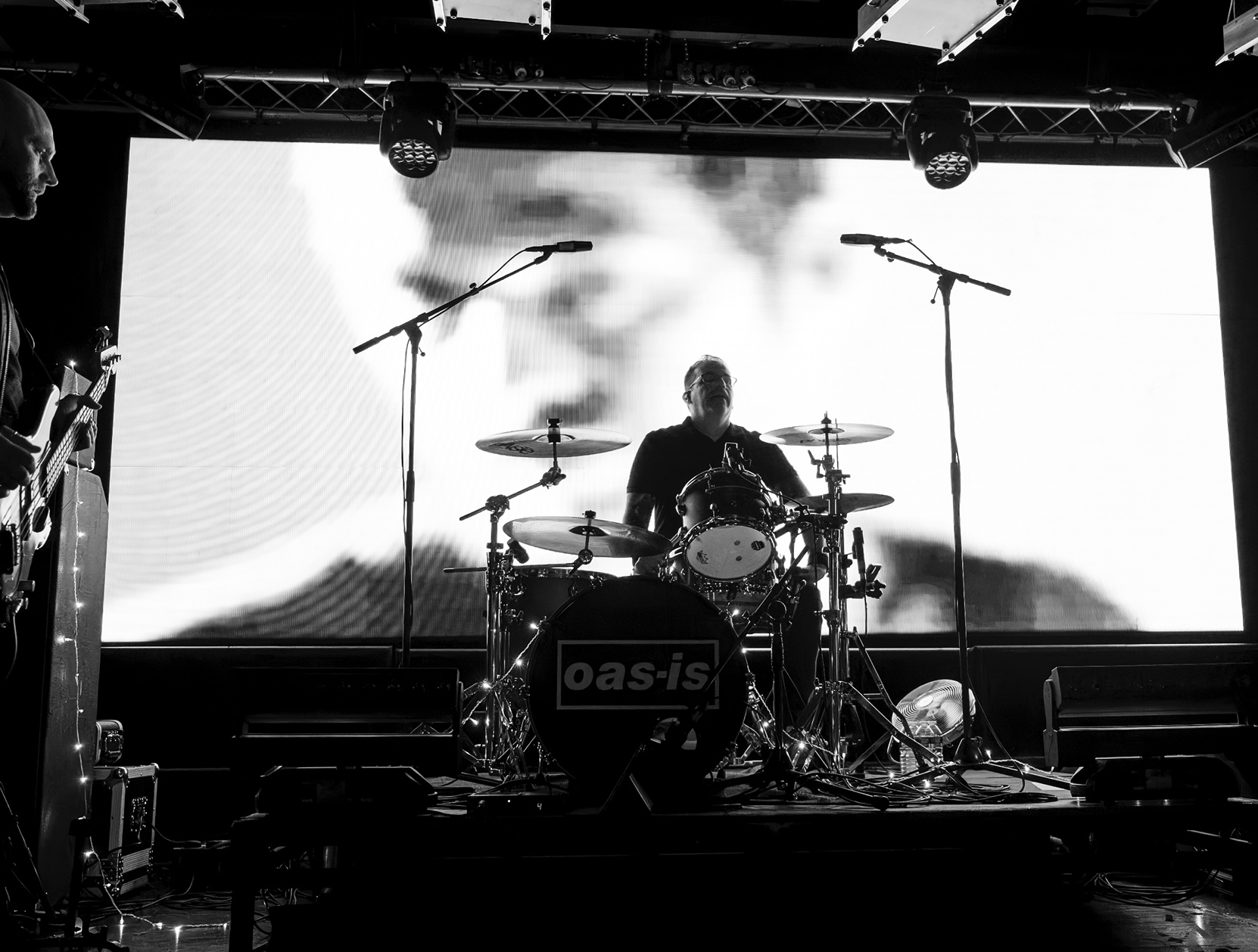 a person playing drums on a stage