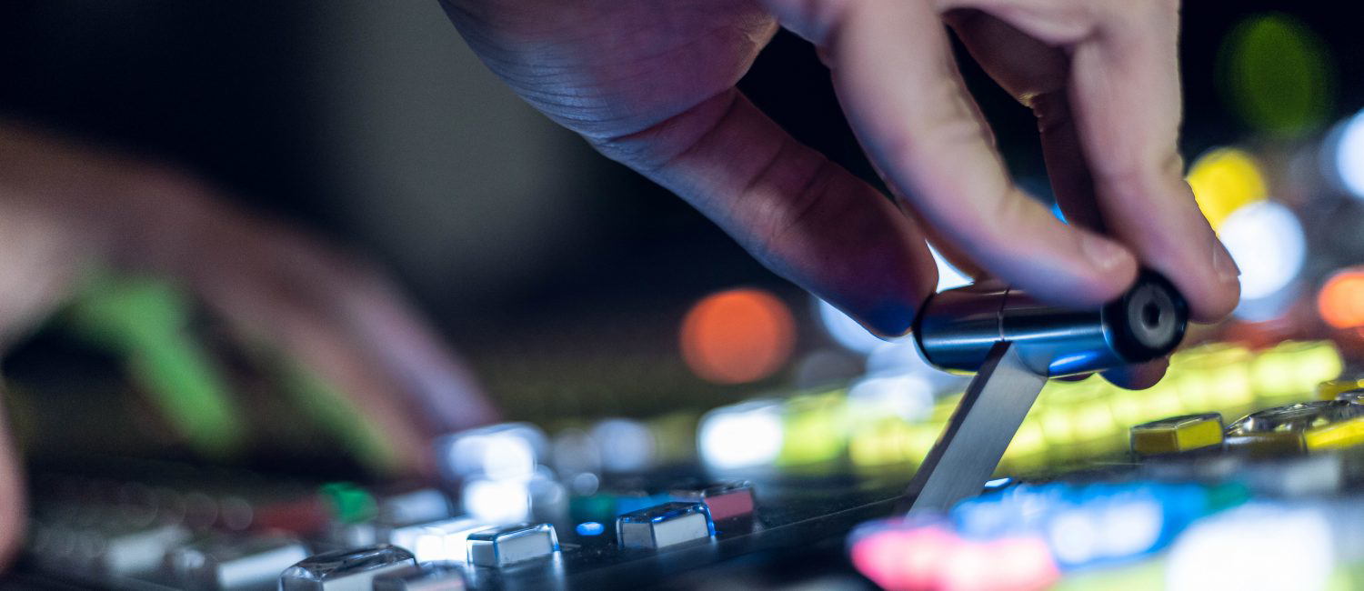 a close-up of hands on a circuit board