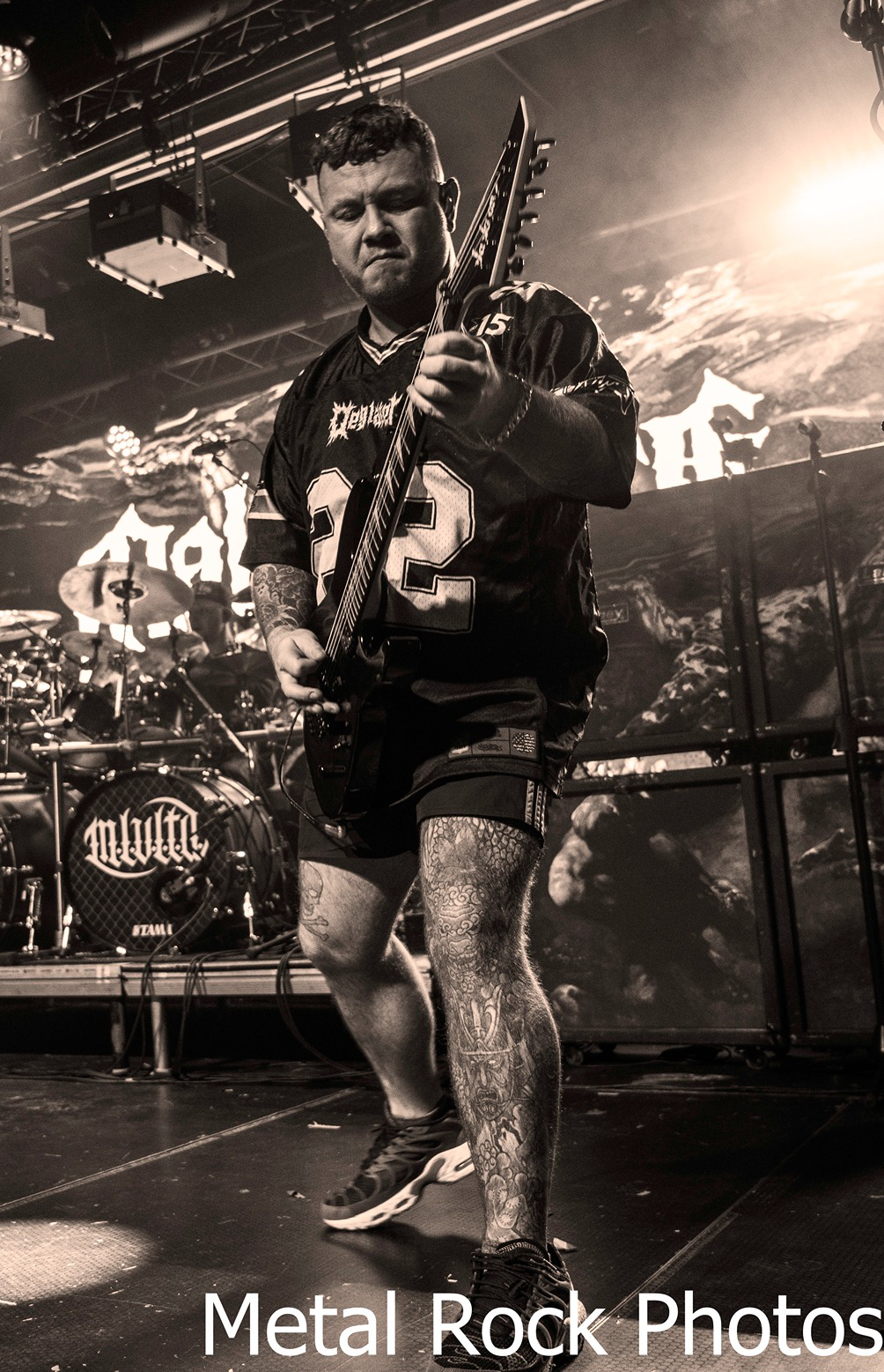 a person holding a guitar