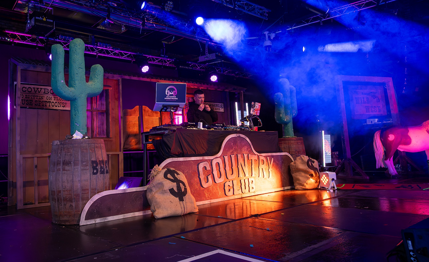 a person standing behind a stage