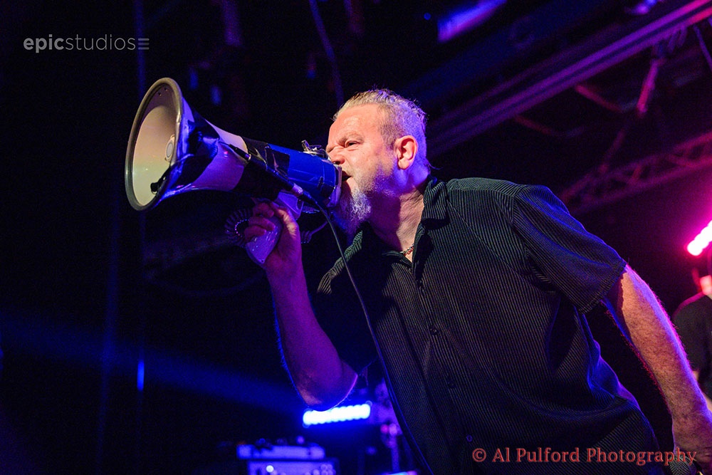 a man holding a microphone